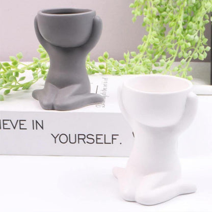 Cache-pot Céramique – Petit Personnage Assis pour Plantes Succulentes