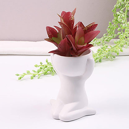 Cache-pot Céramique – Petit Personnage Assis pour Plantes Succulentes