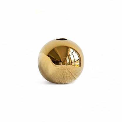 Collection de Vases Boule Dorée – Glamour Sculptural pour Votre Intérieur