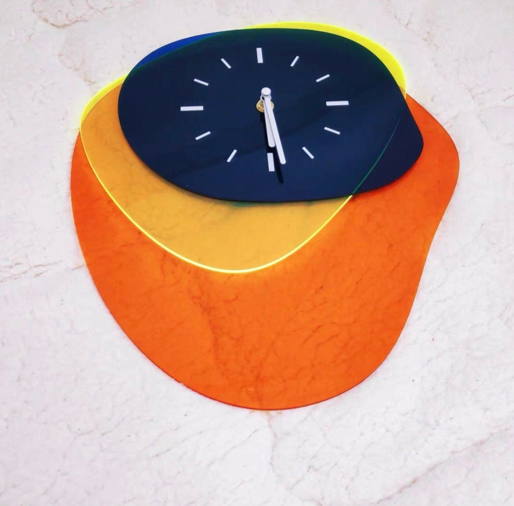 Horloge Murale Abstraite en Acrylique Transparent – Design Moderne et Artistique