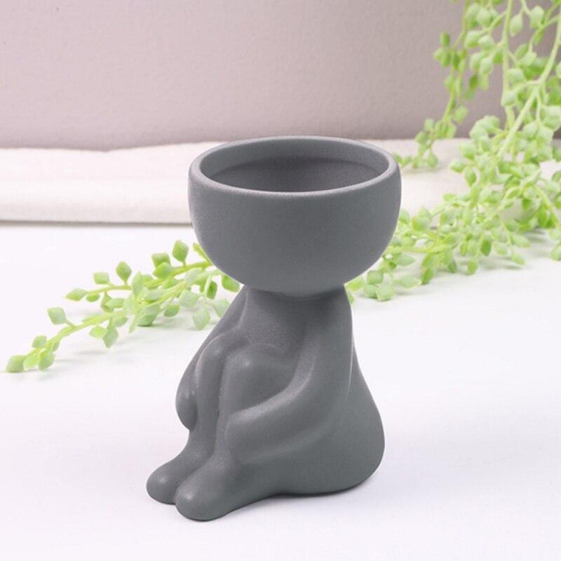 Cache-pot Céramique – Petit Personnage Assis pour Plantes Succulentes