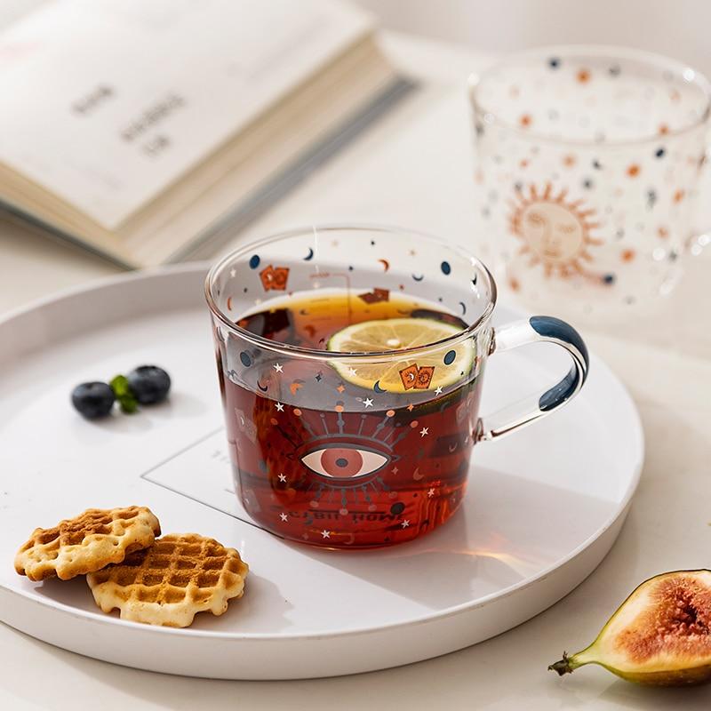 Tasse en Verre Soleil & Œil Protecteur